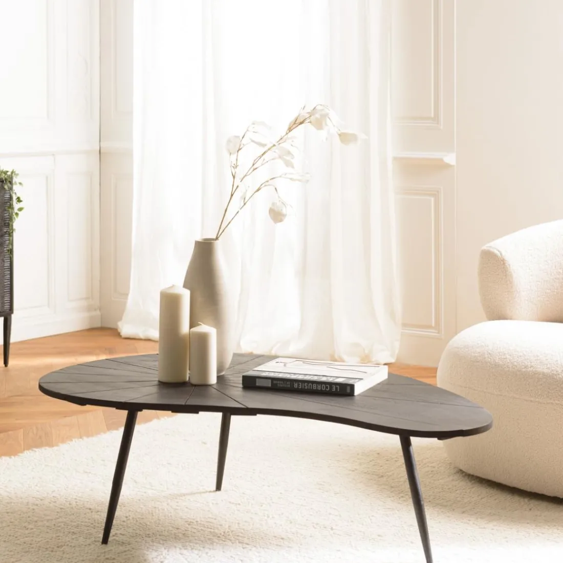 Table basse ovoïde plateau texturé Noir mat et pieds en Fer noir JAMES