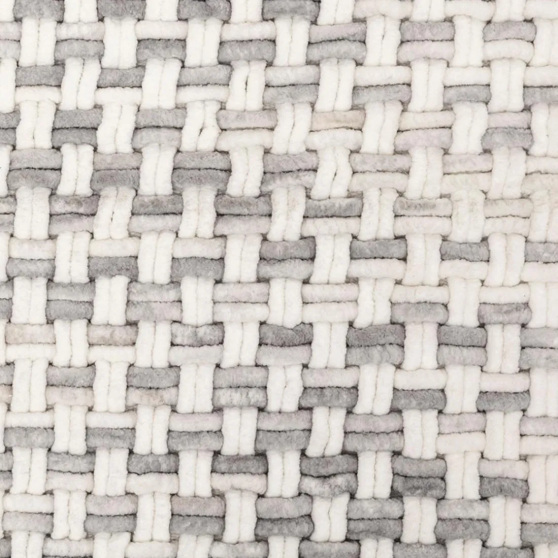 Tapis tressé gris